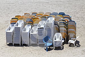 Stack of plastic chair.