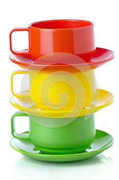 Stack of plastic colorful cups and plates - perfect for picnic