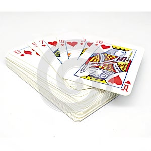 Stack of playing cards isolated on white background
