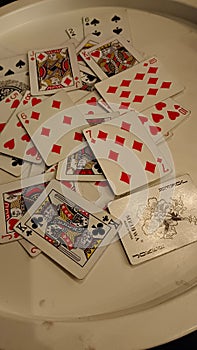 a stack of playing cards in play