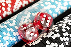 Stack of poker chips with dice rolls isolated background. Poker game concept. Playing a game with dice. Casino Concept for busines