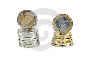 Stack of polish zloty and euro coins