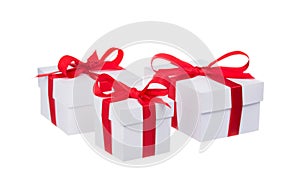 Stack of presents white gifts ribbon red bow isolated on white background