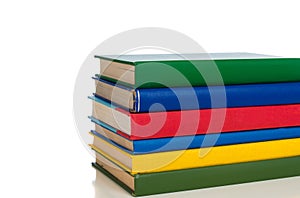 Stack of primary colored textbooks