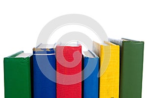 Stack of primary colored textbooks