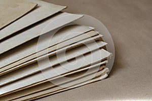 Stack of rectangular sheets of recycled paper