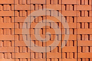 Stack of red clay bricks