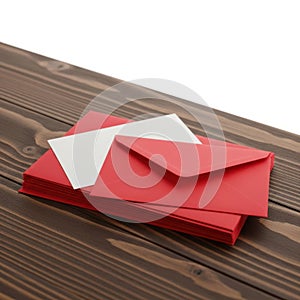 Stack of red envelopes and white cards isolated on white background