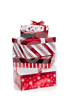 Stack of red and white wrapped Christmas presents