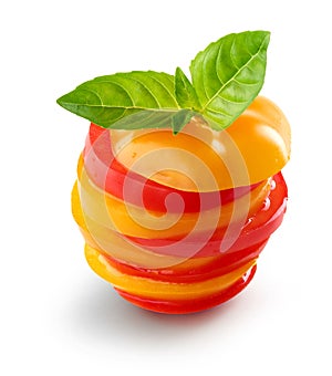 Stack of red and yellow tomato slices