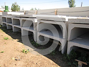 Stack of reinforced concrete blocks at a construction site