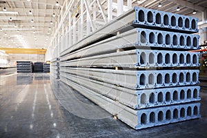 Stack of reinforced concrete slabs in a factory workshop