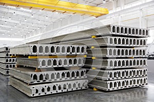 Stack of reinforced concrete slabs in a factory workshop