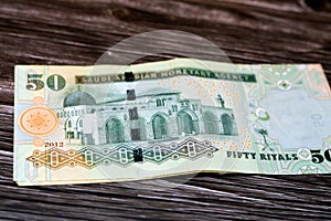 Stack of the reverse side of Saudi Arabia 50 SAR fifty Saudi riyals cash money banknote with the photo of Al Aqsa Mosque