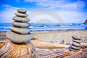 Stack of Rocks Upon Driftwood at Ruby Beach, Washington