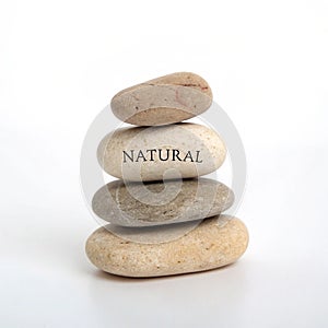 Stack of rocks labeled 'Natural' isolated on white background