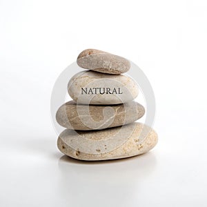Stack of rocks labeled 'Natural' isolated on white background