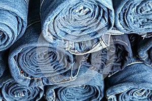 Stack rolled jeans texture on whole background