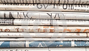 Stack of Rolled Newspapers Close Up