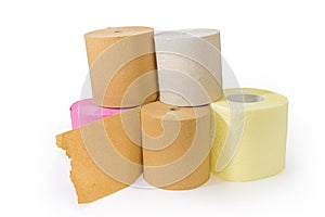 Stack of rolls of toilet paper different quality and colors