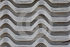 Stack of  roof tiles. waving tiles. texture of roof background