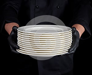 Stack of round white empty plates