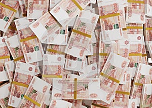 Stack Russian cash or banknotes of Rusia rubles scattered on a white background isolated The concept of Economic, Finance, Backgro photo