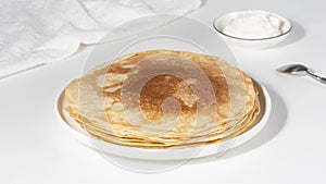 Stack of russian thin pancakes blini with red caviar. Stop motion animation
