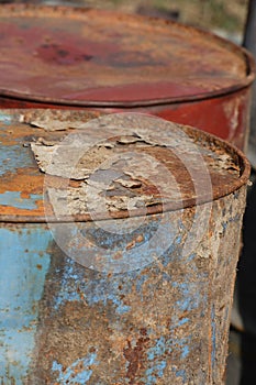 Stack of rusting barrels