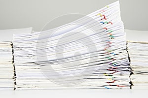 Stack of sales and receipt overload between paperwork