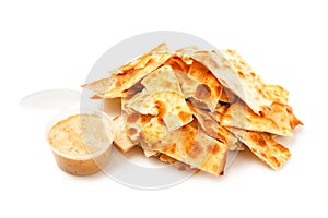 Stack of salted crackers isolated on white background