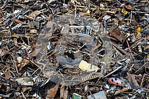 stack of scrap metal at recycling junkyard