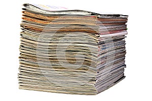 Stack of sewing magazines isolated on white background
