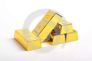 Stack of shiny gold bars on white background