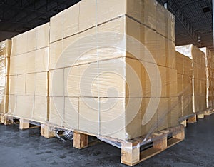 Stack of shipment boxes on wooden pallet the warehouse storage. Cargo export & shipping warehousing, Logistics and transportation