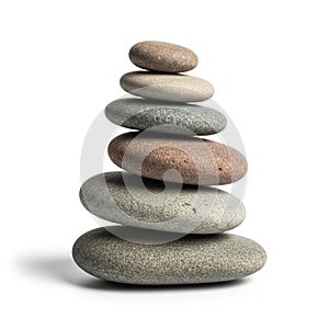 Stack of six smooth pebbles balanced vertically against a white background