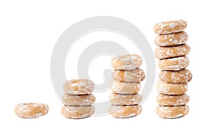 Stack of small cakes with hole isolated over the white background