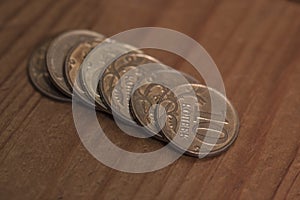 A stack of small copper coins of 10 cents