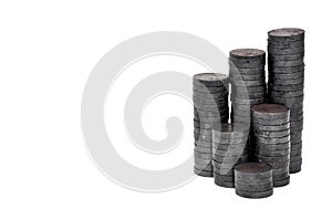 Stack of small round magnet isolated on white background