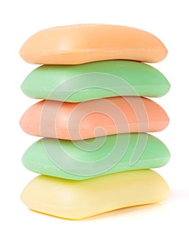 Stack of soap different colors isolated on white background