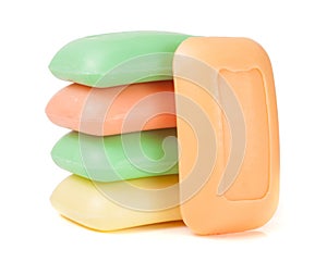 Stack of soap different colors isolated on white background