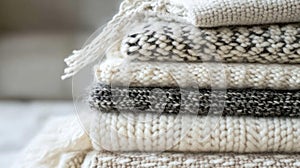 A Stack of Soft Knitted Wool Sweaters