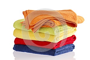 Stack of soft towels in the colors of the rainbow