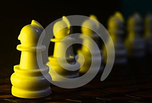 Stack of Soldiers Pawns Troop Lying on a Dark Surface Photograph