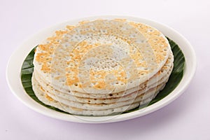 Stack of South Indian breakfast dosa.