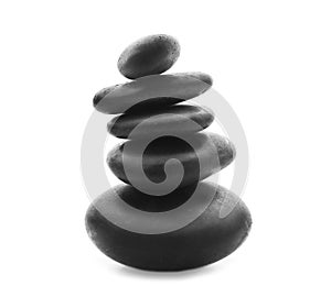 Stack of spa stones on white background