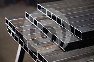 stack? of square? steel tubes? profile or pipes for construction supplies and welding works