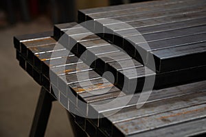 stack? of square? steel tubes? profile or pipes for construction supplies and welding works