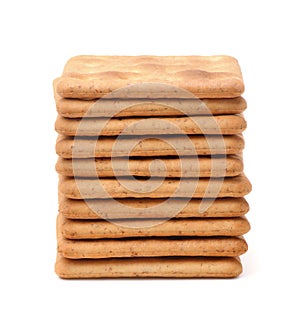 Stack of square wholegrain crackers photo