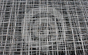 Stack of steel construction mesh with rust. Steel mesh background